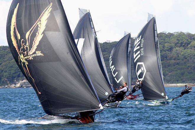 Triple M leads a group of skiffs off Clark Island - JJ Giltinan 18ft Skiff Championship © Frank Quealey /Australian 18 Footers League http://www.18footers.com.au